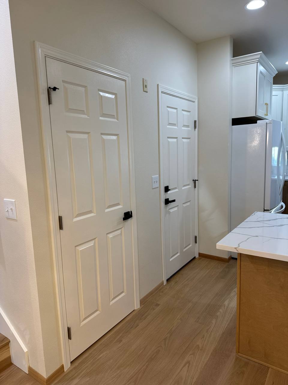 Interior doors installation with matte black hardware